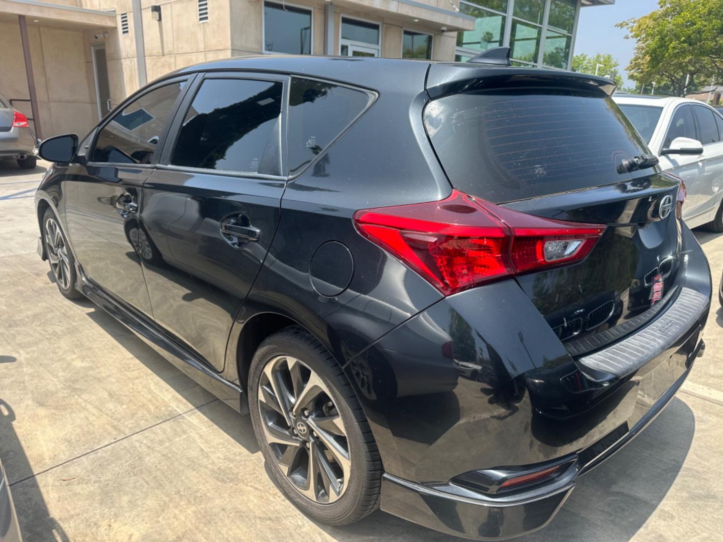 2016 Black /Black Scion iM Cloth (JTNKARJE7GJ) with an 1.8 4 Cylinder engine, Automatic transmission, located at 30 S. Berkeley Avenue, Pasadena, CA, 91107, (626) 248-7567, 34.145447, -118.109398 - 2016 Scion iM 1.8: Your Ideal Pre-Owned Hatchback in Pasadena, CA When searching for used BHPH cars in Pasadena, CA, the 2016 Scion iM 1.8 stands out as a premier choice. This versatile hatchback combines efficiency, style, and practicality, making it a highly sought-after vehicle in the pre-owned - Photo#1